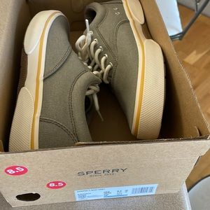 Sperry casual sneaker. New. Kind of a khaki greenish color.